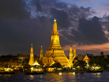 Buddhist Temple Lit Up at Dawn, Wat Arun, Chao Phraya River, Bangkok, Thailand Photographic Print
