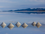 Salt Pyramids Wait for the Sun in a Flooded Salf Flat in Uyuni,