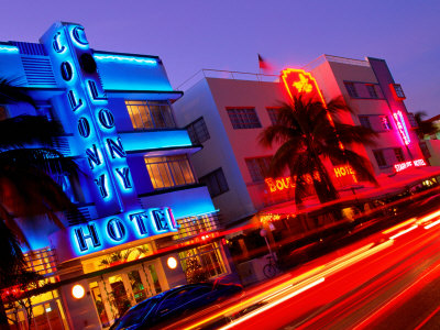 Car Light Trails Passing Neon Lights of Art Deco Hotels on Ocean Drive 