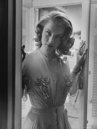 Actress Linda Christian in Gown with Plunging Neckline Wearing Small Cross