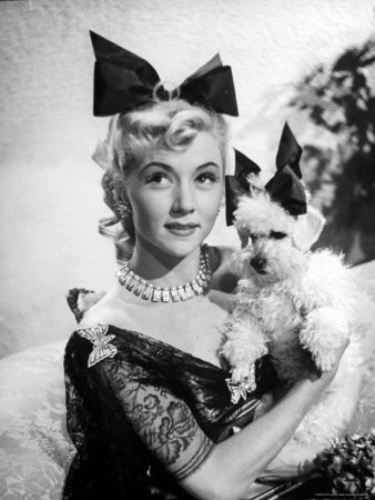 Gloria Grahame with Her Pet Poodle Wearing Identical Bows on Their Heads