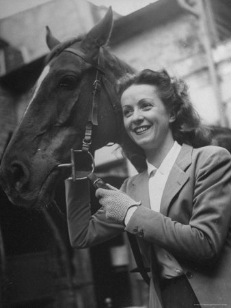Danielle Darrieux Posing with Horse Premium Photographic Print