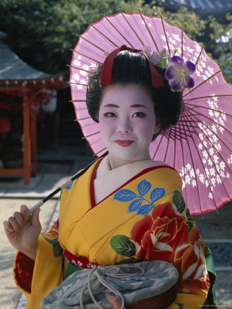 Apprentice Geisha Maiko Woman Dressed in Traditional Costume Kimono 