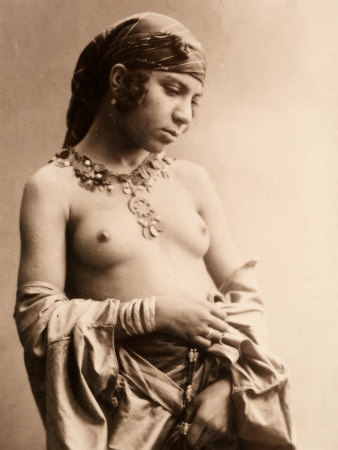 of a Partially Nude Young Woman Covered with Jewels and Oriental Cloths