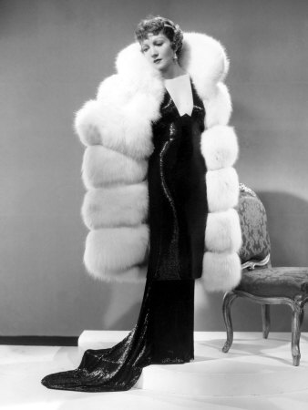 Claudette Colbert in Travis Banton Gown and White Fox Fur Coat c1935