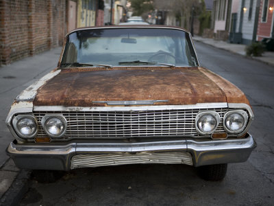 Rusty Old Car in the French Quarter of New Orleans Photographic Print