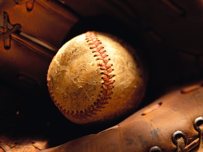 Old Baseball in Glove Stretched Canvas Print
