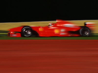 Formula One-Ferrari in Motion Stretched Canvas Print