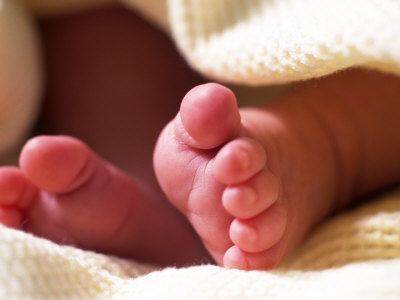 Close-up of Baby's Feet Stretched Canvas Print