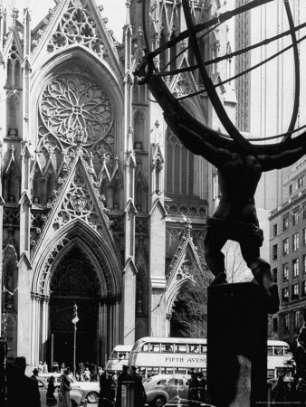 Entrance to St. Patrick's Visible Across Fifth Avenue, with Atlas Statue Silhouetted in Foreground Stretched Canvas Print