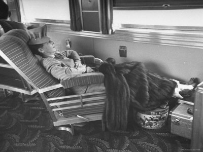 Sleeping Chairs on Woman Sleeping On A Lounge Chair In The Observation Lounge Car Premium