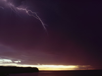 A Bolt of Lightning Crosses a Stormy Sky Photographic Print A Bolt of Lightning Crosses a Stormy Sky Photographic Print