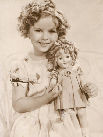 Shirley Temple American Child Star of the 1930s Seen Here with a Shirley Temple Doll Stretched Canvas Print