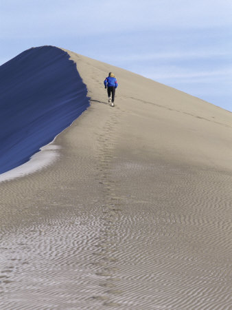 Rear View of Woman Running Up a Sand Dune Photographic Print Rear View of Woman Running Up a Sand Dune Photographic Print