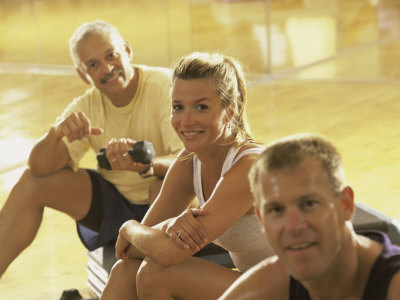 Portrait of Two Men And a Woman in a Gym Photographic Print Portrait of Two Men And a Woman in a Gym Photographic Print