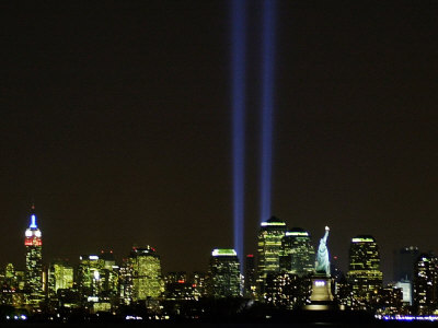 Two Beams of Light Light up the Sky Above Manhattan Stretched Canvas Print