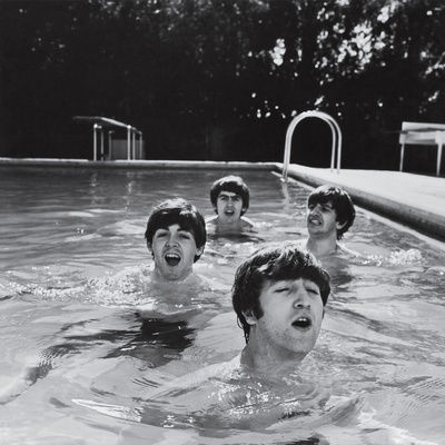 Paul McCartney, George Harrison, John Lennon and Ringo Starr Taking a Dip in a Swimming Pool Stretched Canvas Print