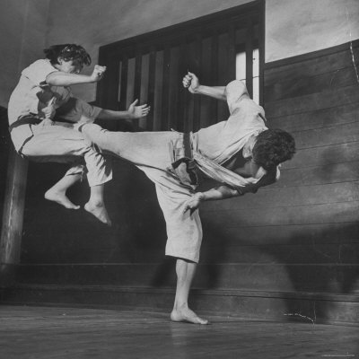 Law Student Gojuro Harada Uses Right Foot on the stomach to ward off attack of economics student Stretched Canvas Print