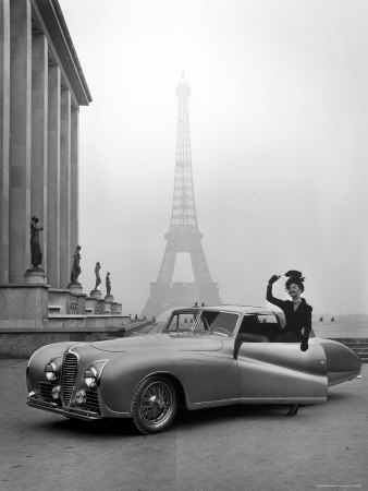 Model Wearing Jacques Fath Ensemble Beside 1947 Model Delahaye Automobile Stretched Canvas Print