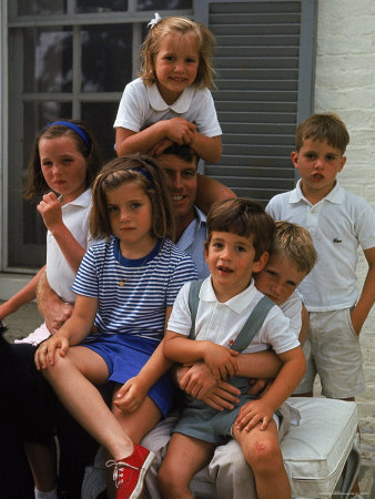 Robert Kennedy Sitting with His...