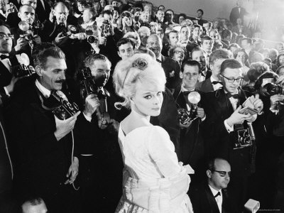 Elke Sommer Attending the Cannes Film Festival Amid a Sea of Photographers