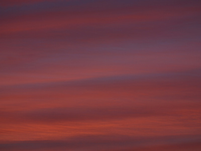 A Deep Red and Purple Sunset Stretched Canvas Print