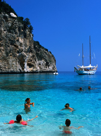 Tourists Swimming in Waters of Cala Mariolu in Gulf of Orosei, Sardinia, 