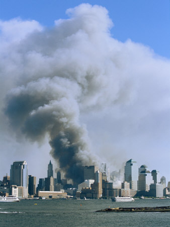 Smoke Billows over Manhattan after the September 11, 2001 Attack Stretched Canvas Print