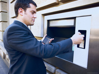 Businessman Putting His Card Into Atm Photographic Print Businessman Putting His Card Into Atm Photographic Print