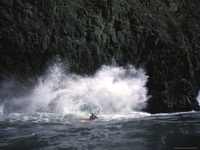 Sea Kayaking by Cliff, USA Premium Poster Sea Kayaking by Cliff, USA Premium Poster