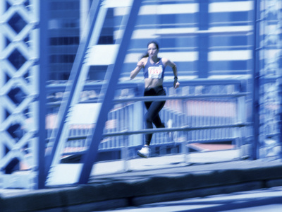 Young Woman Running Photographic Print Young Woman Running Photographic Print