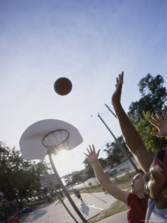 Two Young Men Playing Basketball Photographic Print Two Young Men Playing Basketball Photographic Print