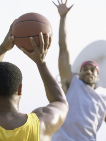 Two Men Playing Basketball Photographic Print Two Men Playing Basketball Photographic Print