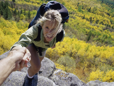 Female Hiker Gets a Helping Hand Photographic Print Female Hiker Gets a Helping Hand Photographic Print