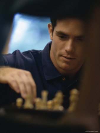 Chess Player Contemplating a Move Photographic Print Chess Player Contemplating a Move Photographic Print