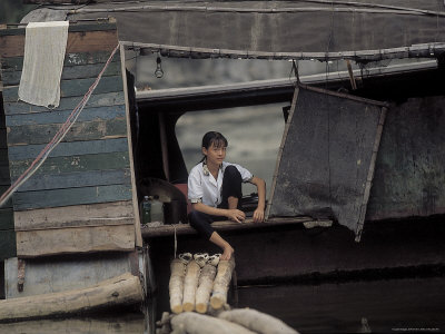 Woman Sitting in a Boat Photographic Print Woman Sitting in a Boat Photographic Print