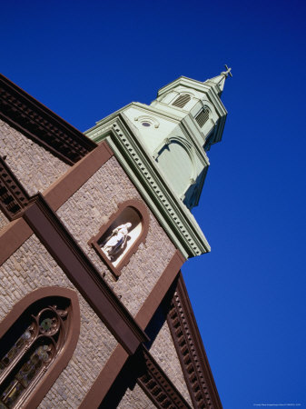Statue and Steeple on Church of Transfiguration in Chinatown, New York City, New York, USA Stretched Canvas Print