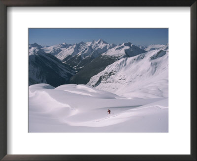 A Skier Heads Down Mount Swanzy Framed Print A Skier Heads Down Mount Swanzy Framed Print