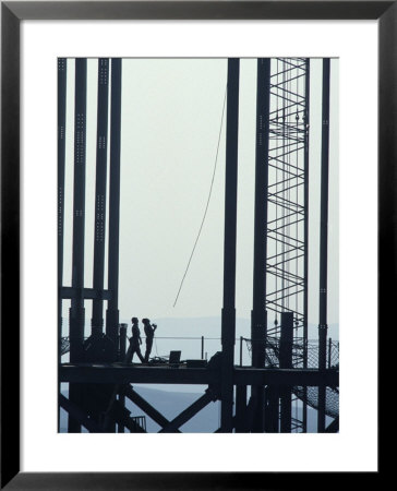 Workers on an Oil Rig Framed Print Workers on an Oil Rig Framed Print