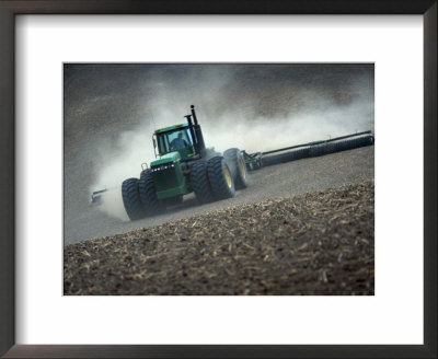 Tractor in Dusty Field Framed Print Tractor in Dusty Field Framed Print