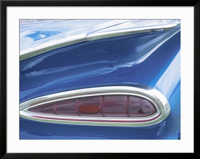 Tail Light on Blue Car Framed Print Tail Light on Blue Car Framed Print