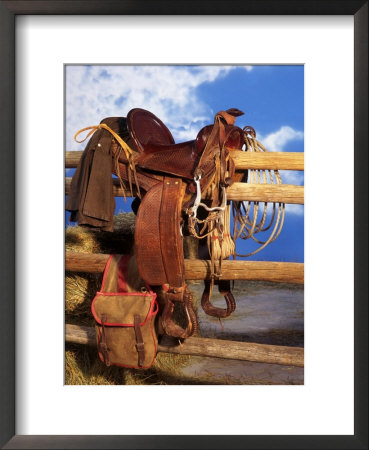Saddle on Wooden Fence Framed Print Saddle on Wooden Fence Framed Print