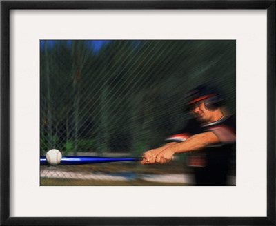 baseball player hitting. Baseball player hitting ball Framed Print. zoom. view in room