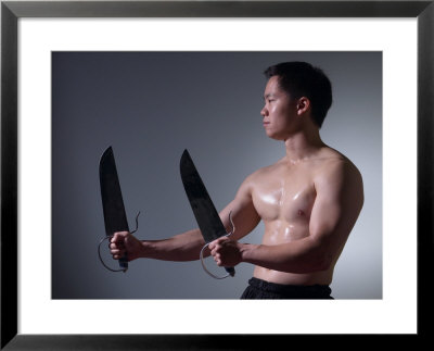 Man with Ceremonial Swords Framed Print Man with Ceremonial Swords Framed Print