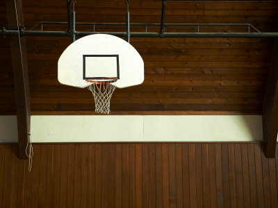 black and white basketball hoop. Basketball Hoop in an Old Gym
