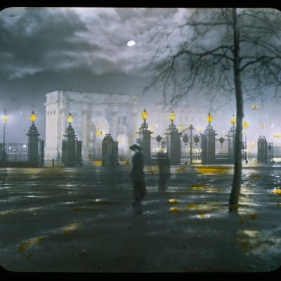 Marble Arch by Night - a Figure Standing in Front of the Park Gates Stretched Canvas Print