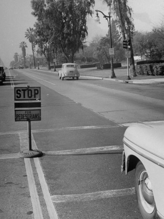 Cars Stopping to Let Pedestrians Pass Stretched Canvas Print