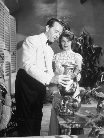 Actress Corinne Calvet and Actor Paul Henreid in a Scene from the Movie "Rope of Sand" Stretched Canvas Print Actress Corinne Calvet and Actor Paul Henreid in a Scene from the Movie "Rope of Sand" Stretched Canvas Print