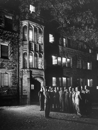 The Gleeclub Singing before Gothic Doorway on Campus Stretched Canvas Print