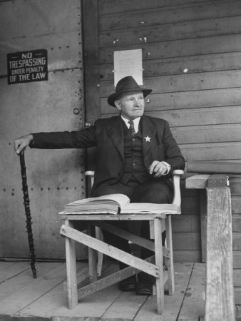 The Custodian of the Opera House Guarding the Stage Door Stretched Canvas Print